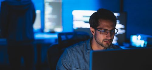A software developer is thinking on improving the efficiency of the AI system. A software developer is thinking on improving the efficiency of the AI system.