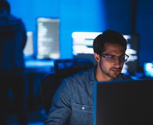 A software developer is thinking on improving the efficiency of the AI system. A software developer is thinking on improving the efficiency of the AI system.